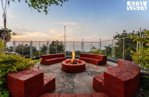 Panhala Villa | StayVista at The Redstone Villa with Bar, Lawn & Pool
