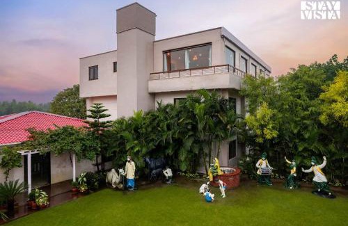 Landran Villa | StayVista's Casba Farm Retreat - Pet-Friendly Villa with Rooftop Lounge, Outdoor Pool, Lawn & Bar