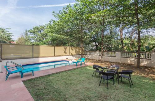 St.Stanislaus Villa Villa | StayVista's Greenwoods Villa 5 - City-Center Villa with Private Pool, Terrace, Lift & Music System
