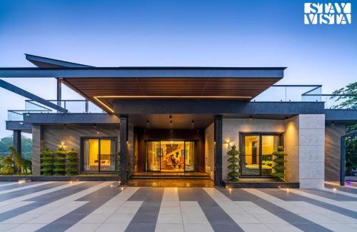 Faridabad Villa | StayVista's Hampton Acres - Outdoor Pool, Vast Lawn & Terrace