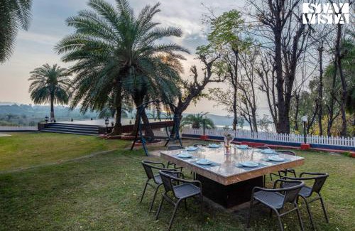 Pathankot Villa | StayVista's Lake Pearl Serenity - Riverside, Mountain-View Villa with Jacuzzi, Sprawling Lawn & Terrace