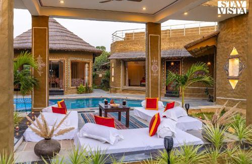 Ajmer Villa | StayVista's Majestic Mud House - Rajasthani Architecture with Modern Amenities, Outdoor Pool, Adventure Activities, and Spa