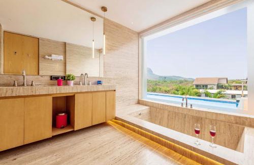Lonavala Villa | StayVista's Villa 107 at Canary Farms - Pure Veg with Huge Lawn, Pool and Home Theatre