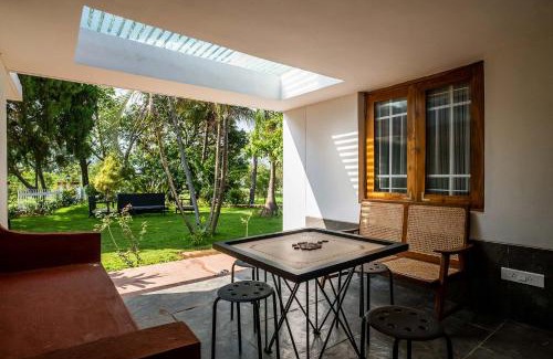 Nashik Villa | StayVista's Villaggio - Orchard Oasis with Pool, Expansive Lawn, Patio & Indoor Activities
