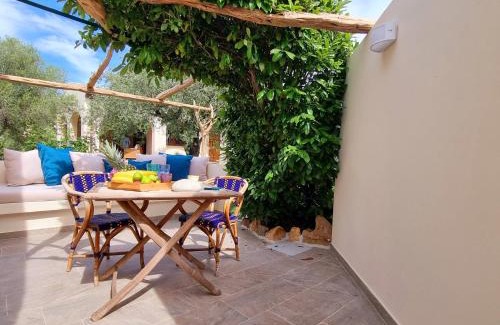 Buddittogliu Straulas Apartment | STAZZO SAN TEODORO IL GINEPRO Piscina Condivisa