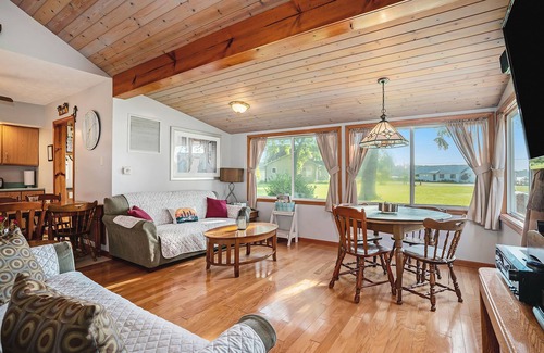 Paw Paw Lake House | Stealth Cottage | Lakeside historic stay with a dock, bars, and athletic courts