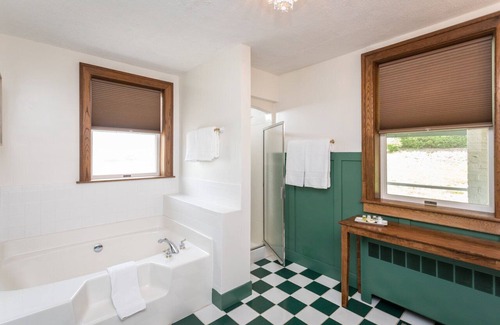Harrisonburg Apartment | Step Back in Time: Experience Charm and Comfort in Our Iris Room