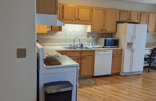Delta Hotel | Step into a welcoming embrace of comfort and scenic tranquility as you explore this inviting 2-bedroom hotel apartment along the Gunnison River in Delta, CO.