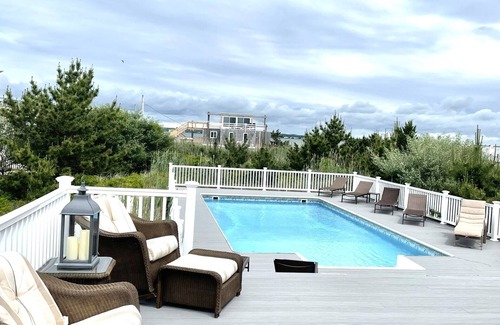Westhampton Beach House | Steps from the Ocean, Private Pool on Dune Rd with Scenic Sunsets.