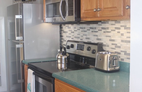 Central Beach Condo | Steps from the Ocean - Beautifully decorated condo with large patio