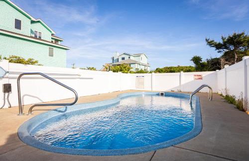 Southern Shores House | Steps to Beach Heated Pool Hot Tub Pet Friendly