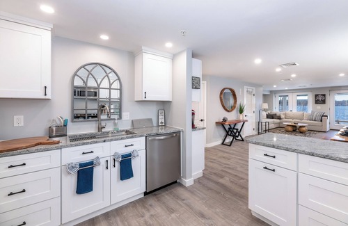 Laconia Condo | Steps to Beach: Lake-View Laconia Getaway!
