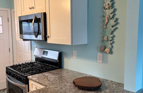 Brigantine Cottage | Steps to Beautiful Brigantine Beach. n1st. Floor Unit with Private Porch.