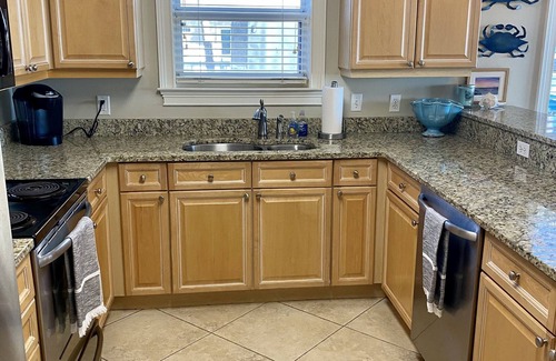 Crystal Beach Condo | STEPS TO THE BEACH! 1st floor end unit with amazing views!
