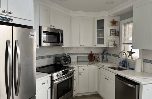 South Seaside Park Condo | Steps to the beach, bay, and restaurants, at the base of Island beach state park