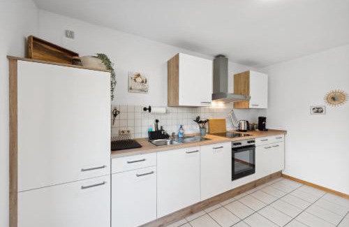 Hetzerath Apartment | stern12 SIRIUS Küche WLAN Arbeitsplatz Parken