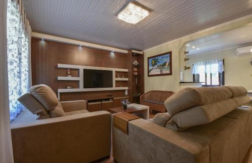 C A I C House | Stillo Gramado Dutra com café da manhã