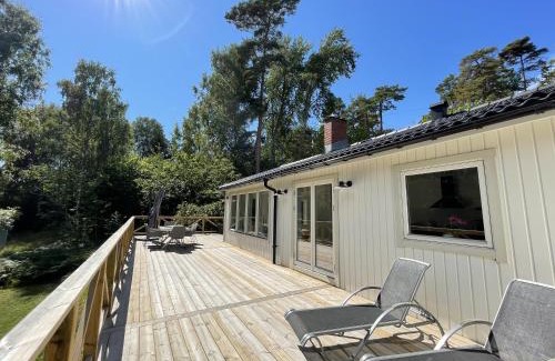Varmdo House | Stockholm archipelago with pool, boat and bikes