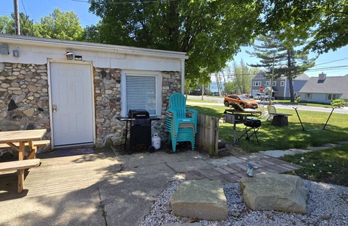 Onekama House | Stone Cottage on Portage Lake with Private Dock