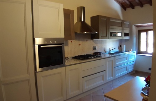 Vitolini House | stone farmhouse immersed in an olive grove owned