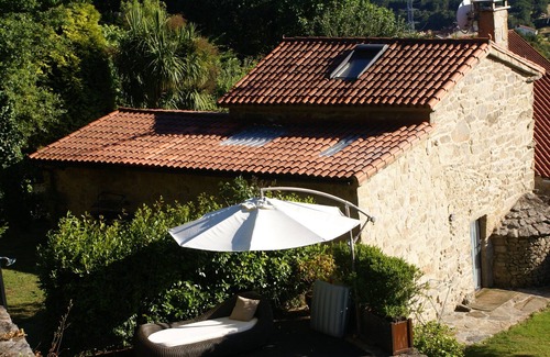 Santiago de Compostela Cottage | Stone house with pool and garden.