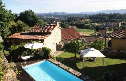 Santiago de Compostela Cottage | Stone house with pool and garden.