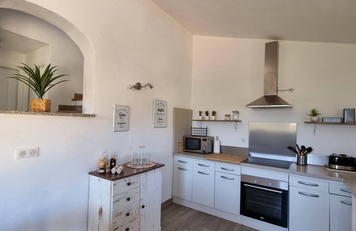 Arbellara House | Stone house located between sea and mountains