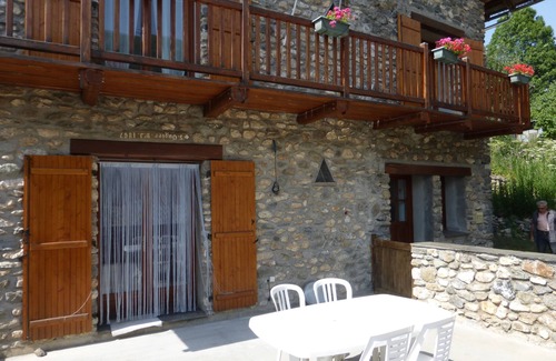 Besse House | Stone house with terrace in typical mountain village on GR 54