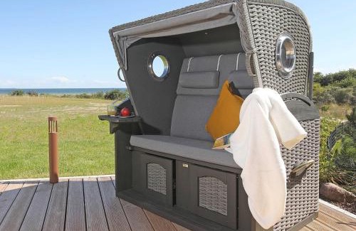 Lobbe Villa | Strandhaus 7 "Ostsee" in Lobbe mit Meerblick, Sauna, Kamin