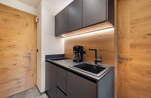 Ultimo Apartment | Studio Apartment 'Apartment Ocher' with Mountain View, Shared Garden and Wi-Fi