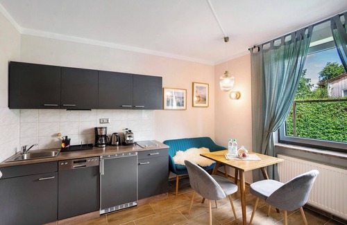Munchen District Apartment | Studio Apartment 'Großes Apartment Mit Gartennutzung' with Shared Terrace and Wi-Fi