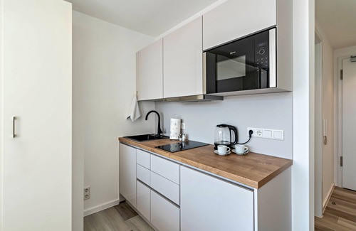Furstenfeldbruck District Apartment | Studio Apartment "Huber Living Basic 302" with Balcony & Wi-Fi