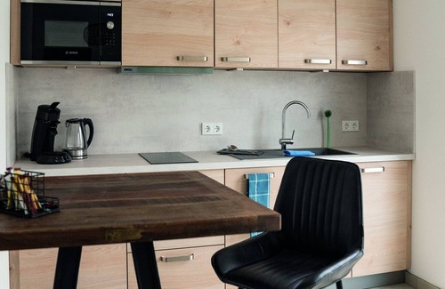 Dormagen Apartment | Studio apartment no. 12 on the 2nd floor left (street side, roof terrace)