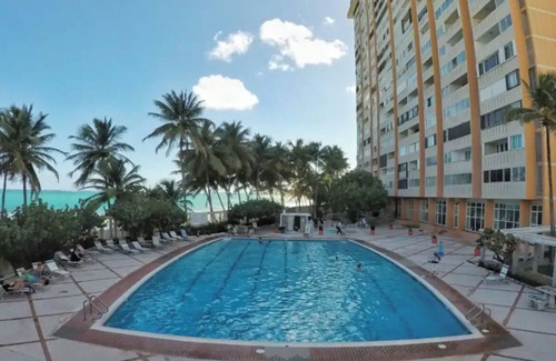 Condado Apartment | Studio Apartment right on the beach with city views, pool, gym and game room