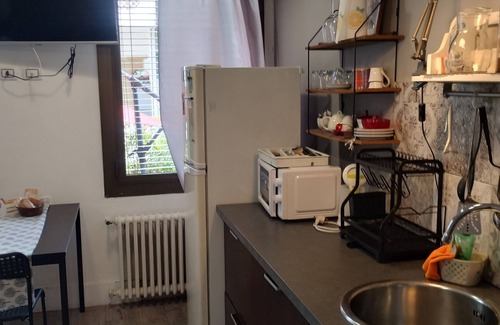 Villaggio degli Sposi Apartment | Studio apartment with patio, minutes from the airport and downtown Bergamo.