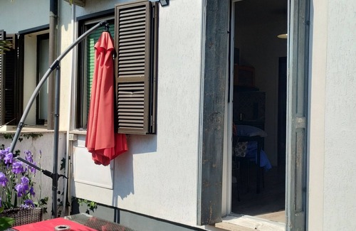 Villaggio degli Sposi Apartment | Studio apartment with patio, minutes from the airport and downtown Bergamo.
