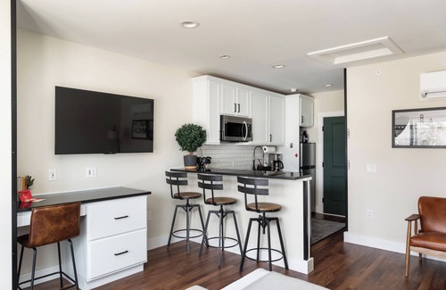 Bellaire Apartment | Studio at Boutique Resort with Hot Tubs, Sauna. Walk to Downtown!