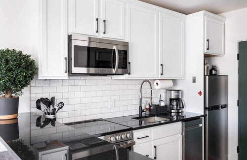 Bellaire Apartment | Studio at Boutique Resort with Hot Tubs, Sauna. Walk to Downtown!