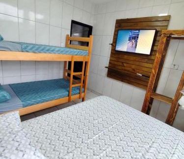 Praia de Leste Apartment | Studio com ar condicionado a 4 quadras do mar