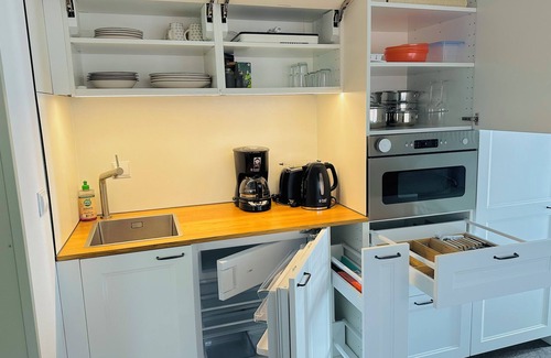 Kuhnhausen Bed & Breakfast | Studio Neunblatt with sleeping area in organic garden B&B just outside Erfurt