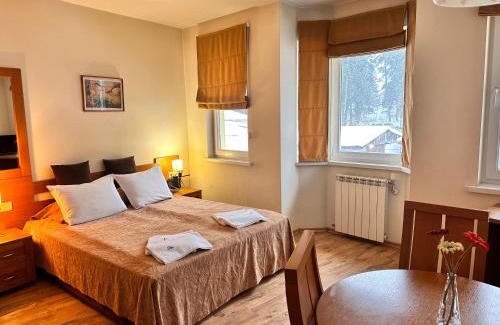 Borovets Apartment | Studio Royal Plaza sleeps 4 Prime location, distance to ski lift - 50M