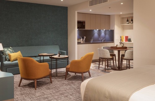 Heathrow Villages Apartment | Studio Suite Close to London Heathrow | Business Centre On-Site + Free Wi-Fi