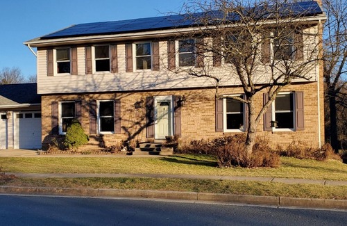 Hanover Apartment | Studio w/3 beds, 1 Queen, two twin, couch, pellet stove, full amenities, shower.
