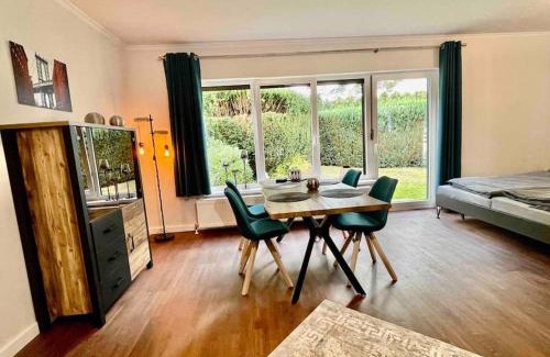 Tungendorf Apartment | Studioappartement mit Privatgarten in ruhiger Wohnsiedlung