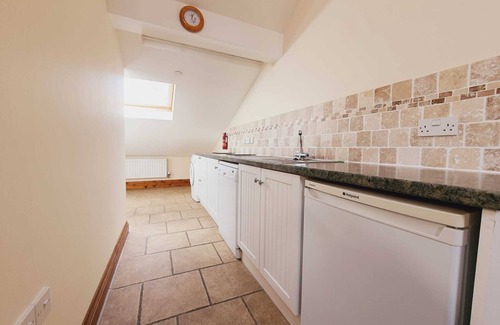 Woolland House | Stunning Barn Conversion with Exclusive Bar, Pool, Hot Tub & Countryside Charm
