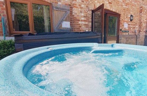 Woolland House | Stunning Barn Conversion with Exclusive Bar, Pool, Hot Tub & Countryside Charm
