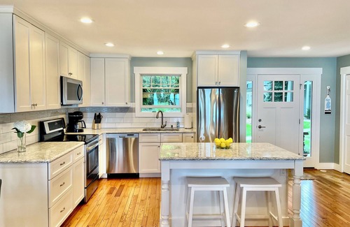 Suttons Bay Cottage | Stunning 150' ft footage on bay, 2 beachfront homes, 5 bedrooms & game room.