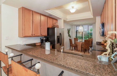 Naples Condo | Stunning 2 bedroom/2 bath + Den in Heritage Bay Golf and Country Club