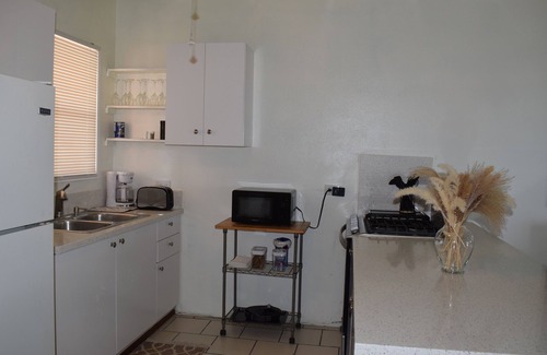 Estate Solberg Apartment | Stunning 2BR Ocean & City View Apt at Sunset Villas -Ideal Location & Amenities!