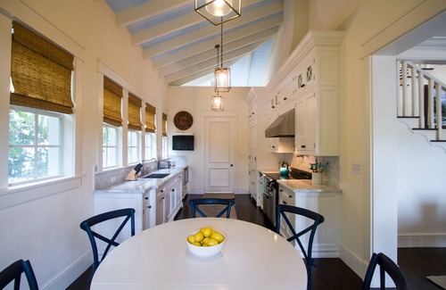 Old Fort Bay House | Stunning 6 bedroom on canal, pool, golf cart & optional Old Fort Bay Club access